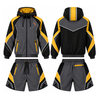 Ensemble coupe-vent d'extérieur avec short en tissu respirant, finition lisse, taille ajustable et veste extérieure entièrement zippée