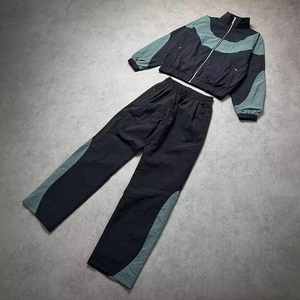 Ensemble survêtement coupe-vent oversize pour homme, 2 pièces : veste zippée et pantalon évasé, 100% nylon, bandes réfléchissantes, nouveau design. - Product Image 3