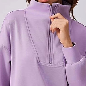 Conjuntos deportivos acampanados de moda para mujer, de corte relajado, ideales para ropa informal y un estilo urbano moderno. - Product Image 5