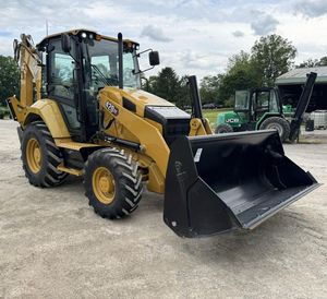 รถตักล้อยางมือสอง Caterpillar 420XE แบบตักหลังขุดด้านหลัง ขับเคลื่อน 4 ล้อ พร้อมบุ้งกี๋หน้า สำหรับงานก่อสร้าง - Product Image 1