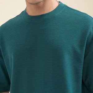 เสื้อยืดคอกลมแขนสั้นสีเขียวเข้มสำหรับผู้ชาย ทรงปกติ สวมใส่สบาย ผ้าถักลายดอกไม้ 100% ผ้าฝ้าย ระบายอากาศได้ดี - Product Image 6