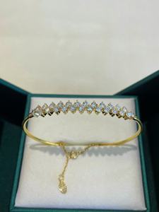 AMBER JEWELS Pulsera de tenis de moissanita chapada en oro de 18K, corte brillante redondo, engaste de garra, unisex, joyería clásica para fiestas - Product Image 1