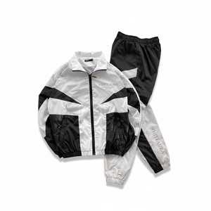 Conjunto de Pantalones y Chaqueta Deportiva Impermeable con Capucha, Unisex, de Nailon, para Otoño, Diseño 2 en 1, Personalizable con Logotipo, OEM - Product Image 1