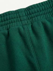Pantalones de chándal casuales de pierna ancha de forro polar suave y transpirable con cintura elástica para mujer, de ajuste holgado, estilo urbano y a la moda. - Product Image 3
