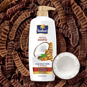 Champú proteico con leche de coco y fórmula enriquecida con shikakai diseñado para reducir la caída del cabello, suavidad, sin parabenos, 650 ml. - Product Image 3