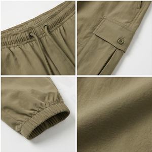 Ropa de moda 2025, pantalones de chándal acampanados con bolsillo de carga apilados de alta calidad para hombres, ropa de calle con múltiples bolsillos personalizados, pantalones cargo de invierno - Product Image 4