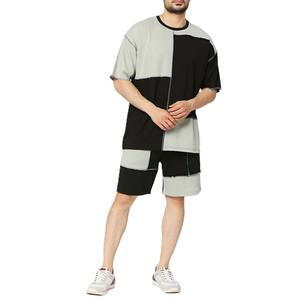 Nuevo conjunto de dos piezas con paneles de patchwork para hombre, camiseta y pantalones cortos con bloques de color negro y gris, conjunto informal de verano para calle, talla grande - Product Image 1