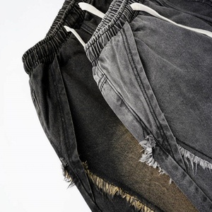 Pantalon de jogging noir pour homme avec cordon de serrage et détails frangés, pantalon streetwear tendance pour les loisirs, la culture hip-hop et urbaine - Product Image 3