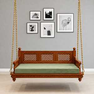 Banc suspendu Jhula artisanal en bois au design traditionnel, avec dossier sculpté orné, suspension à chaîne en laiton et assise rembourrée pour balcon - Product Image 1