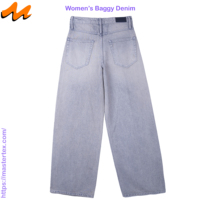 Jean décontracté pour femme en denim, coupe ample et large, double ceinture, poches fendues, déchirures et effets usés, délavage élégant, 100% coton