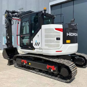 Mini-pelle compacte d'occasion de 3000 kg, jaune, avec lame de bouteur avant et chenilles en caoutchouc pour un nivellement résidentiel précis - Product Image 1