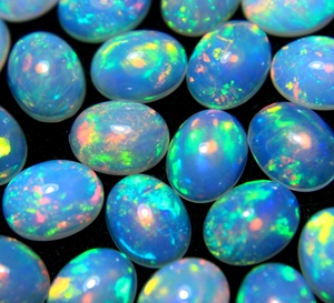โอปอลเอธิโอเปียหลากสี โอปอลธรรมชาติ รูปทรงวงรี คาโบชอง สีไฟหลากหลาย เวโลโอปอล สำหรับทำเครื่องประดับ HASNAIN GEM - Product Image 3