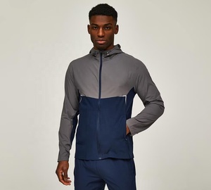 Chaqueta Deportiva TriPro para Hombre, con Capucha, Diseño Color Block Gris Marino, Cierre Completo, Ligera e Impermeable, de Poliéster/Nailon - Product Image 1
