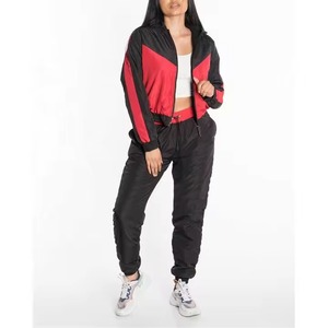 ชุดกีฬาผู้หญิงแบบ 2 ชิ้น ปรับแต่งโลโก้ได้ ไซส์พลัส ระบายอากาศได้ดี น้ำหนักเบา กางเกงวอร์มกันลม เหมาะสำหรับกิจกรรมกลางแจ้งในฤดูหนาว - Product Image 1