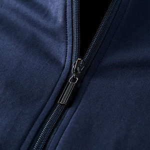 Elite male athletic sets. Sleek zip jackets with contrast side paneling. Flexible <b>joggers</b> in soft. breathable fleece. - Product Image 4