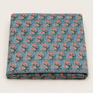 Tissu en coton imprimé à la main à motifs floraux bleus et roses pour la confection de robes, de costumes, de dupattas, de textiles de couture et de vêtements. - Product Image 1
