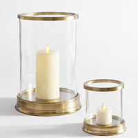 Nuevo diseño: Juego de 2 portavelas de cristal con base de metal dorado, soporte de lujo para velas, ofrece opciones de personalización.