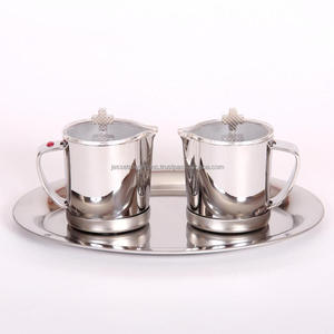Ensemble de Cruet élégant en laiton avec finition nickelée forme de pichet Design moderne avec croix sur et plateau ovale supérieur pour religieux - Product Image 1
