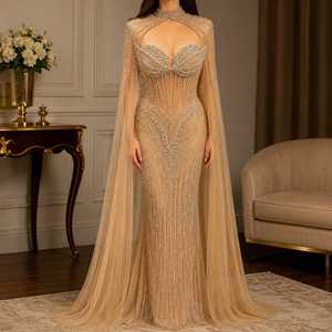 Vestido de sirena color champán nude con adornos de cristales, capa transparente, manga casquillo, corsé, largo hasta el suelo, escote corazón - Product Image 1