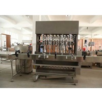 Machine de remplissage et de bouchage automatique de haute qualité pour l'huile comestible, l'huile de coco et l'huile d'arachide, disponible à la vente