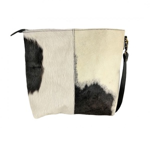 Bolso de hombro de cuero de vaca genuino de alta calidad, pelo blanco y negro, estilo bohemio con decoración de borlas, proveedor directo - Product Image 3
