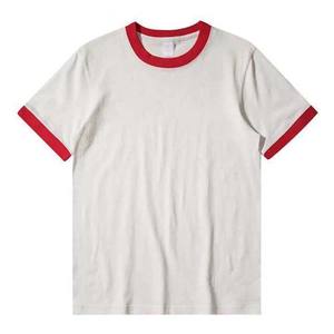 Camiseta Ringer con diseño personalizado, logotipo bordado en chenilla, dorada y negra. - Product Image 2