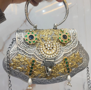 A trio of dual-tone gold and <b>silver</b> brass hand <b>clutches</b> featuring varied textured weaves, floral relief carvings, and top handle - Product Image 5