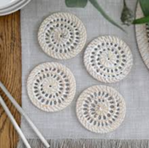 Vibrant orange fringe rim woven straw coaster mats adding modern style to dining room <b>tables</b>, available at wholesale prices. - Product Image 5