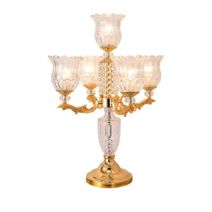 Vintage brass dive arm tabletop <b>candelabra</b> highlighting an intricate scrollwork pedestal, available at wholesale prices. - Product Image 5