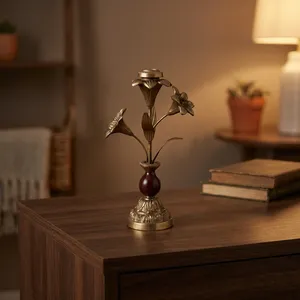 Porte-bougie antique doré à motif floral, avec un élégant design de tige de lys et une perle décorative en bois rouge profond. - Product Image 3