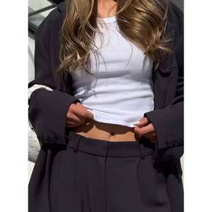 <b>Women's</b> Elegant Turtleneck <b>Cropped</b> <b>Tops</b> Sleeveless Embroidery <b>White</b> Fitted Ribbed Tank <b>Top</b>-Tight Fit <b>for</b> Gym OEM Customizable - Product Image 1