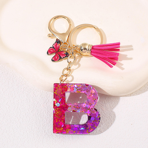 Llavero de resina rojo-morado con purpurina, letra y dije de mariposa, borla, llavero personalizado, bonito colgante para bolso para mujeres y niñas - Product Image 3