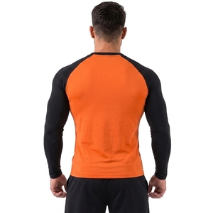 Camiseta Deportiva Unisex Naranja y Negra de Manga Larga, Secado Rápido, Spandex y Poliéster 260g, Estampado por Transferencia de Calor, Bloques de Color - Product Image 2