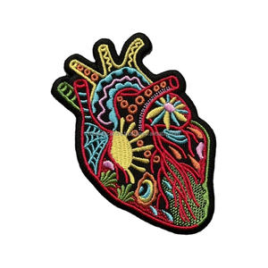 Écusson professionnel en PVC souple avec logo personnalisé nouveau style de badges en caoutchouc de silicone avec décoration en dentelle tissu sergé imprimé - Product Image 1