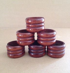 Porte-serviettes rond classique en bois pour une présentation de dîner de luxe, idéal pour les restaurants et les repas traditionnels. - Product Image 2