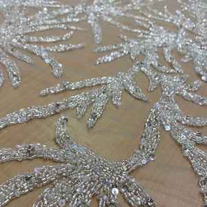 Tissu en dentelle brodée à la main et perlée, best-seller, idéal pour les robes de soirée et la création de mode haute couture, disponible à un prix avantageux - Product Image 1