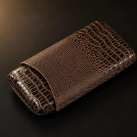 Porte-cigares en cuir de qualité supérieure avec coupe-cigares intégré, accessoire de voyage personnalisable offrant un rangement sécurisé et une protection élégante