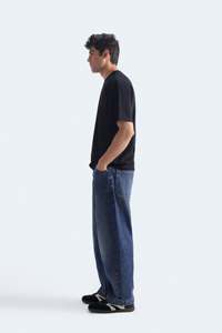 เสื้อยืดโอเวอร์ไซส์ผู้ชาย ผ้าฝ้าย คอกลม ไหล่ตก สตรีทแวร์ สกรีนโลโก้ตามสั่ง - Product Image 3