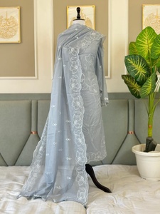 Élégant ensemble trois pièces non cousu en tissu Banarasi, comprenant un haut, un bas et un dupatta en textile tissé, idéal pour les occasions festives et spéciales. - Product Image 1