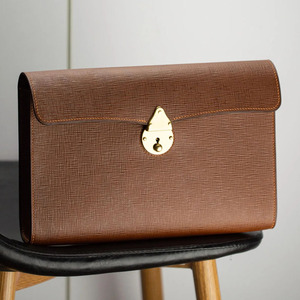 Bolso de mano de cuero genuino premium con organizador de llaves inteligente, almacenamiento compacto y cremallera de alta calidad a un precio asequible. - Product Image 2