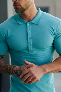 เสื้อโปโลผู้ชายทรงสลิมฟิตแขนสั้นสีพื้นผ้าถักลำลองสีฟ้าอ่อน - Product Image 6