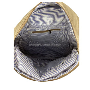 <b>Backpack</b> Hair on Cowhide Accents the Top Leather Flap and Sides& Copper Metal Accents Indian Manufacturer Supplier Saman Exports - Product Image 5