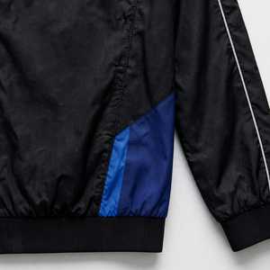 Veste coupe-vent sportive bicolore noir et bleu, manches longues, col montant, fermeture éclair, légère, en polyester - Product Image 5