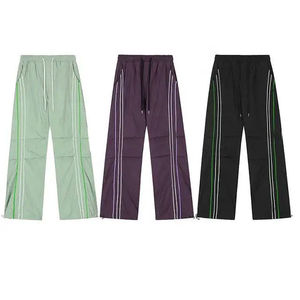 Pantalones de chándal casuales acampanados para hombre, novedad OEM, pantalones de nailon holgados con rayas laterales, pantalones rectos apilados - Product Image 6