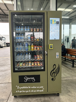 Distributeur automatique de boissons et de collations pour les cinémas avec panneaux latéraux insonorisés
