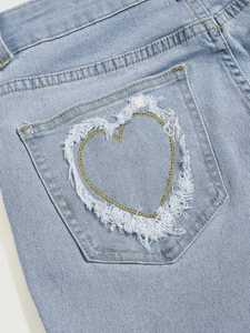 Vaqueros acampanados de mujer de tiro alto, lavado claro, ajustados, con cinturón deshilachado y hebilla de corazón - Product Image 5