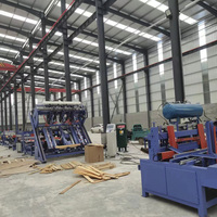 Ligne de production de palettes entièrement automatique à haut rendement, machine à blocs de palettes en bois / cloueur / ligne d'assemblage pour usine