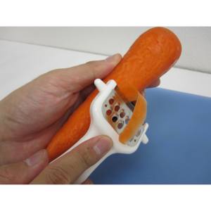 Pelador de Plástico Manual de 2 Vías para un Uso en la Cocina que Ahorra Tiempo - Product Image 2