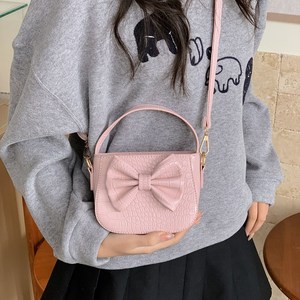 Sac à bandoulière pour enfants, sac à main mignon avec nœud de couleur unie, sac d'accessoires pour petites filles, nouveau modèle - Product Image 2