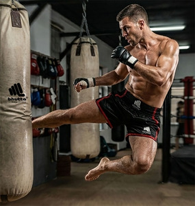 กางเกงชกมวยไทย MMA ทรงหลวม ผ้าซาติน ระบายอากาศได้ดี ผลิตจากโพลีเอสเตอร์ 100% สำหรับทุกเพศ จาก Wholesale Bhutta Enterprises - Product Image 3